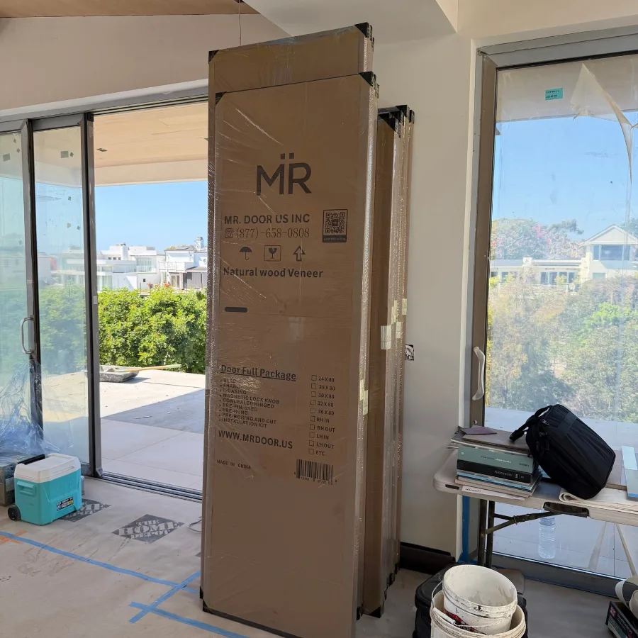 Door carton custom-printed with a brand name, delivered to a project site