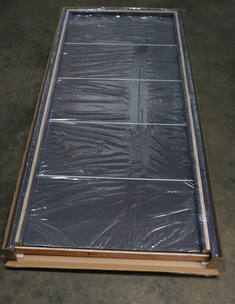 A pre-hung door in its frame, packed in one box with its casings and installation kit
